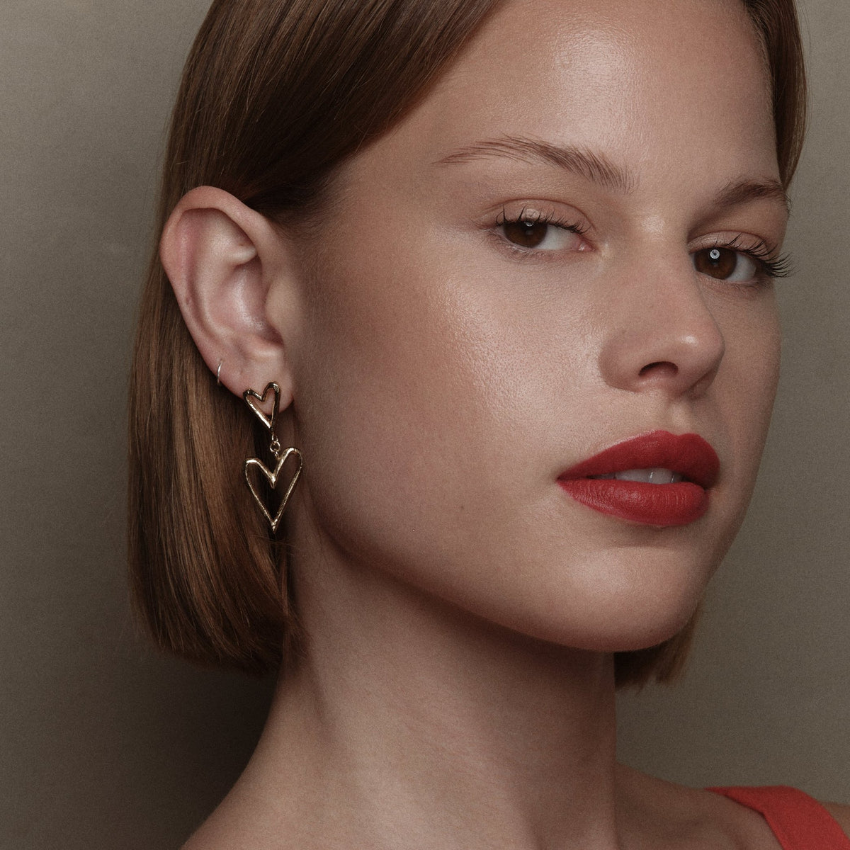 Gold-Plated Silver Double Heart Earrings by Aurore Havenne