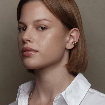 Piercing en argent plaqué or par Aurore Havenne