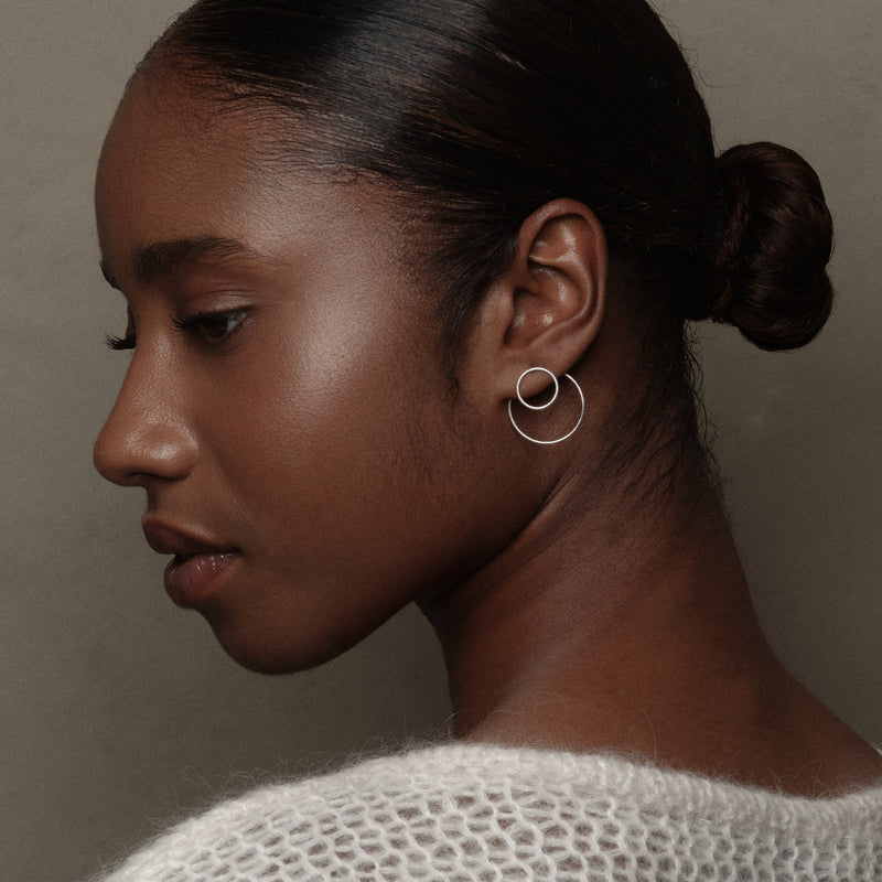 Silver Double Circle Earrings by Belgian jewelry brand Aurore Havenne